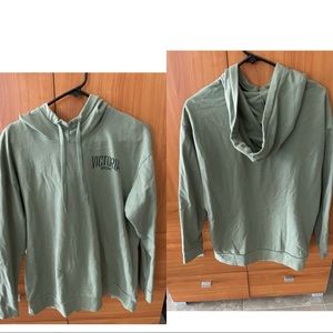 Victoria’s Secret Spot sweatshirt in olive green.